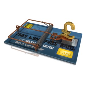 A credit card trap with a gold pound symbol as the temptation. This clip-art can represent the dangers of credit card debt.