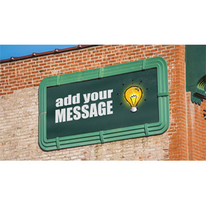 Customize the image on the old-fashioned billboard on the side of a brick building.