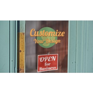 Create your own custom design on the glass of a door to a retail shop.