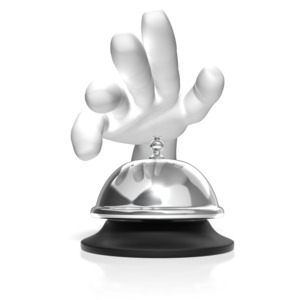 A hand prepares to ring a call bell.