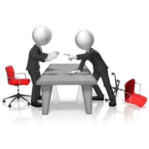 Two businessmen get into an argument at a conference table.