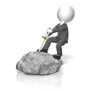 A businessman tries to pull a sword from a stone. This clip-art can represent a business person accomplishing a great task.