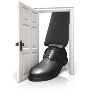 An image of a shoe in a doorway.