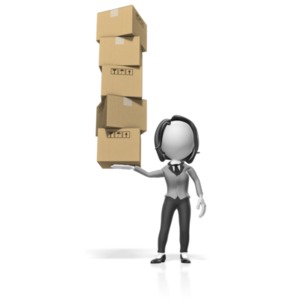 A businessman holds a stack of cardboard boxes with just one hand.