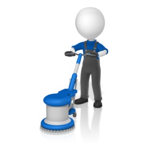 A man in overalls uses an electric floor buffer.