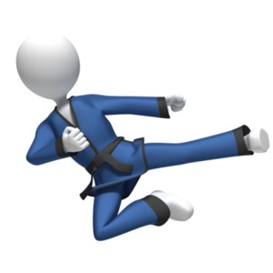 This clip art image shows a martial arts figure doing a fly kick.