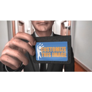 A man in a suit holds up an ID with your custom design on it.