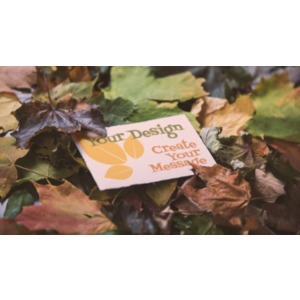 Design your own message on this card laying in a pile of autumn leaves.