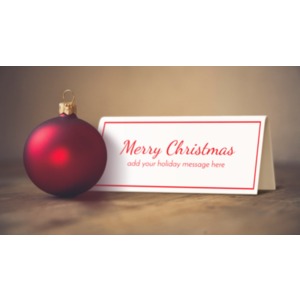 A Christmas ornament with a blank name card. You may add your own message to the card using our on-line tools.