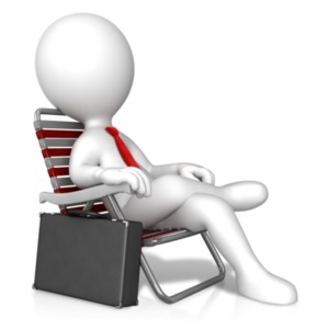 An image of a business figure relaxing in a chair.