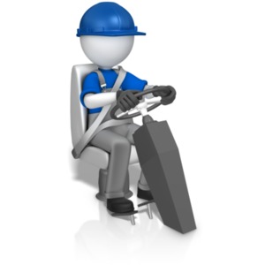 This clip art image shows a worker figure driving while seat belted in and wearing a hardhat.