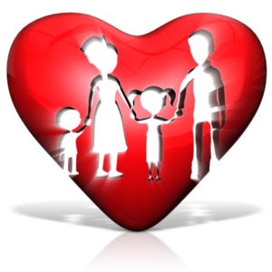 This clip art image shows a silhouette if a family inside of a heart. 