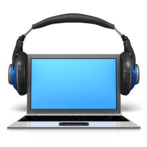 This clip art image shows a laptop with a pair of headphones on it.