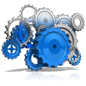 This clipart image shows a group of gears going from a wire frame draft sketch to full completed gears.