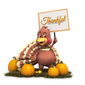 A Thanksgiving turkey holds a sign and stands in a pumpkin patch.