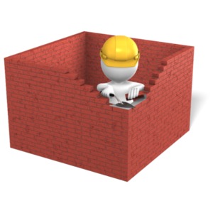 A figure in a construction hat builds for brick walls around them.