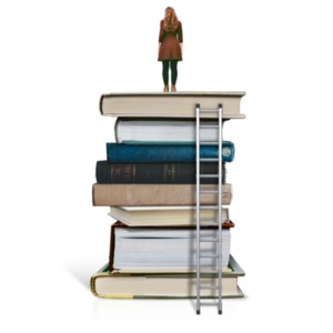 We see an image of a stack of books and the backside of a woman standing there on top.