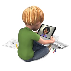 A young boy learns at home as he video conferences with a teacher.