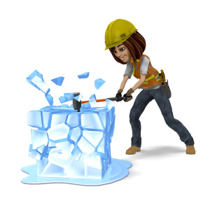 This clipart image features the presentation character Talia breaking a large block of ice.  Talia is wearing a construction outfit and is swinging a large sledgehammer downward onto the large brick of ice.  The ice is breaking apart in all directions.  Use this clipart image as a visual representation of the idiom &quot;Break The Ice.&quot;