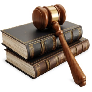 A detailed judge&#039;s gavel sit atop a pair of old textbooks. Isolated on a transparent background.