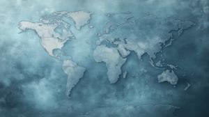 A stylized world map in blue and gray tones, ideal for educational or travel presentations. 

