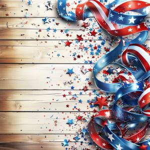 A festive patriotic background with red, white, and blue ribbons and star confetti on a wooden surface. 

