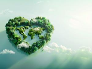 This image depicts a heart-shaped island with a world map, symbolizing environmental love and sustainability.

