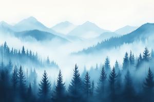 A misty blue landscape featuring mountains and evergreen trees, evoking tranquility and peace.

