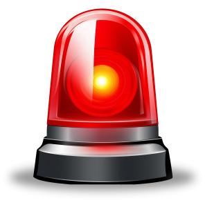 This image features a red emergency alert light, symbolizing notifications and urgent alerts.