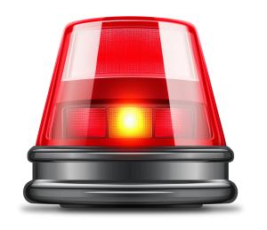 A red police emergency light symbolizing urgency and public safety.
