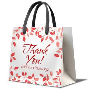 A modern white shopping bag with black handles, ideal for retail or gift-giving themes.