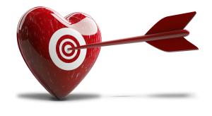 Download this clipart image of a red heart with a bullseye target pierced by an arrow, symbolizing love and desire.