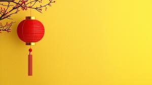 This vibrant background features a red lantern on a yellow backdrop, symbolizing Chinese New Year celebrations.

