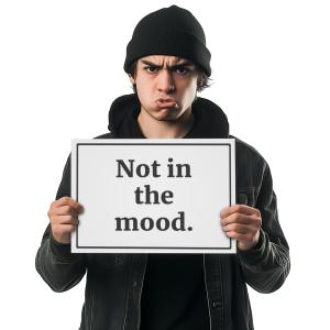 Customize or download the clipart image of a young man expressing annoyance with a sign that says &quot;Not in the mood.&quot;