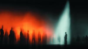 This abstract image depicts blurred figures in contrasting red and blue tones, symbolizing business dynamics.