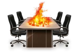 Clipart of a conference table erupting in flames. Perfect for presentations on workplace conflict, leadership failure, or meeting chaos.