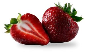 A close-up of ripe strawberries, one whole and one sliced, against a black background.