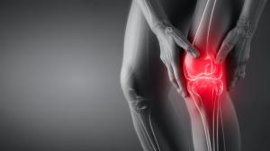 This image illustrates knee pain with a focus on anatomy and discomfort in the joint area.