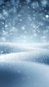  
A serene winter background featuring falling snowflakes and frosty effects.

