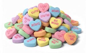 Download this Presentation Clipart of colorful Valentine's Day candy hearts for use in your romantic presentation design.