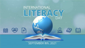 An open book and a spinning globe celebrate International Literacy Day. A SlideClip Video Project