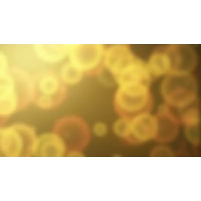 An abstract video background of blurred lights and particles.
