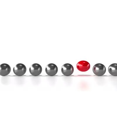 A single red metallic ball bounces up and down among a line of static gray spheres.  You can change the color of this video background using the color controls in the customizer.