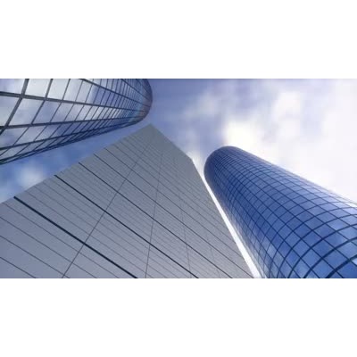 A video of a downtown view looking up at three skyscrapers.