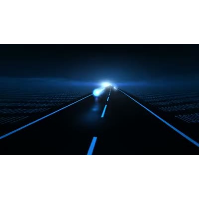 Streaks of digital light pass each other on a highway in a digital landscape.