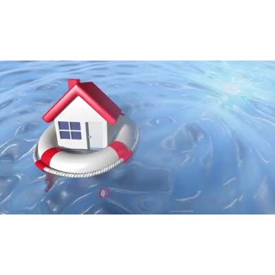 A video background featuring a house inside a life preserver ring.  A concept of rescuing a struggling real estate market or providing mortgage relief.