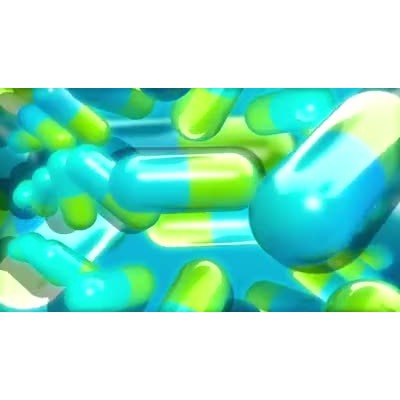 A video background featuring pills falling.