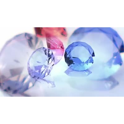 A three diamonds glimmer with different colors.