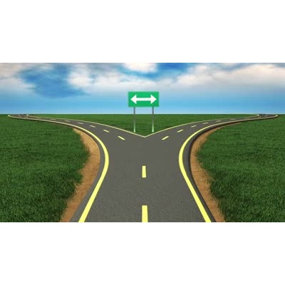 A video of a road that splits into two paths with clouds rolling in the background.