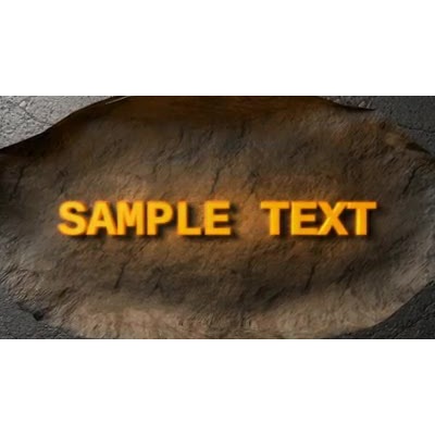 Part of a concrete wall crumbles and falls away to reveal your glowing text underneath.